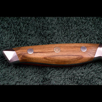 Detail des ergonomischen Olivenholzgriffs von SKeld®